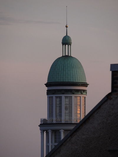 Low angle view of church against sky at dusk