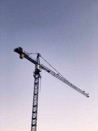 Crane in front of blue sky 