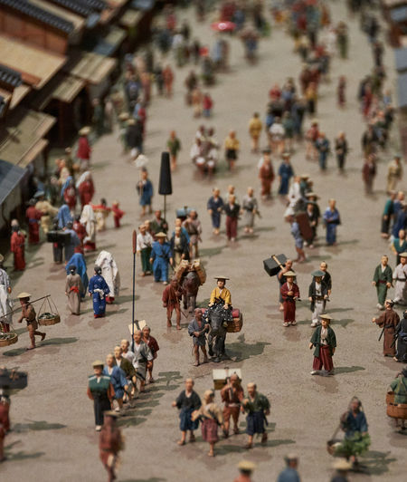 High angle view of model depicting people and buildings of historic japan