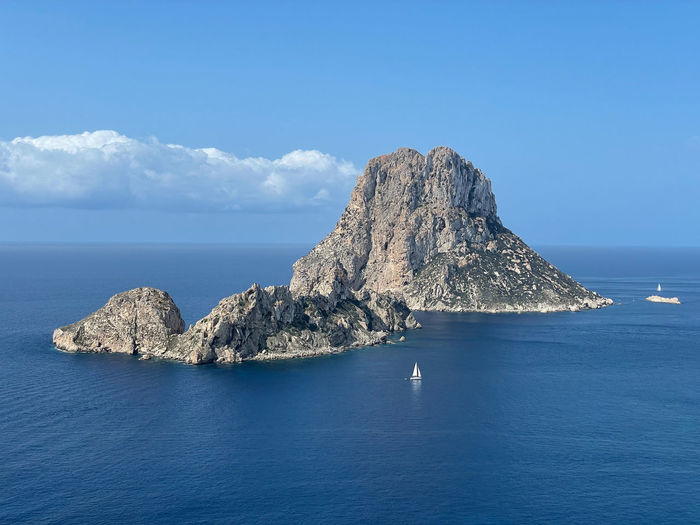 Scenic view of sea against blue sky, es vedra on ibiza