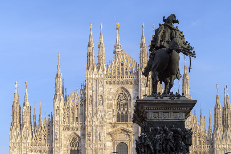 Vittorio emanuele ii statue infront of the cathedral in milano