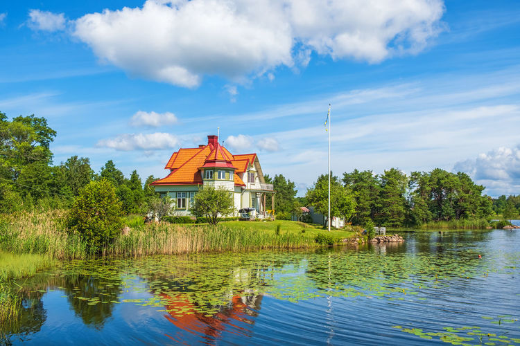 Idyllic house on a hill at a beautiful lake
