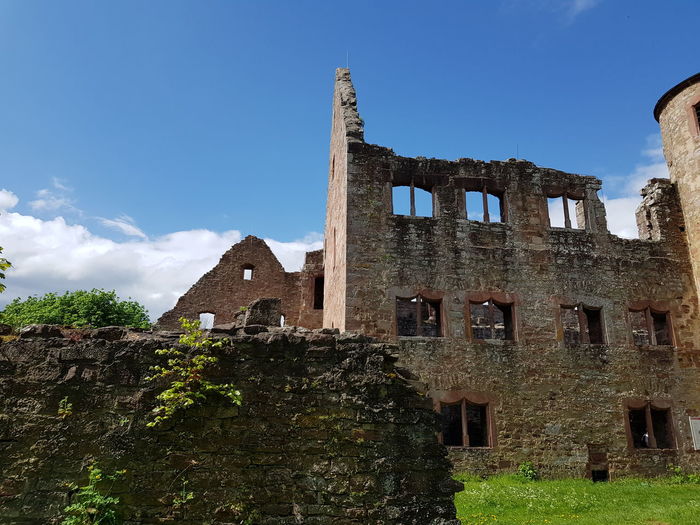 Low angle view of old building against sky
