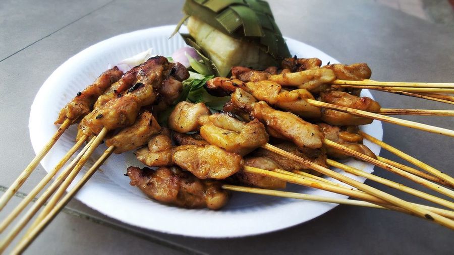 Close-up of satay served in plate