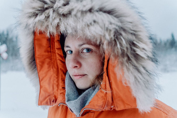 Portrait of woman in snow