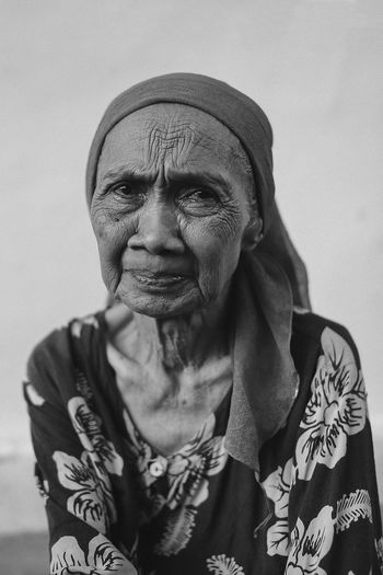 Portrait of senior woman wearing headscarf