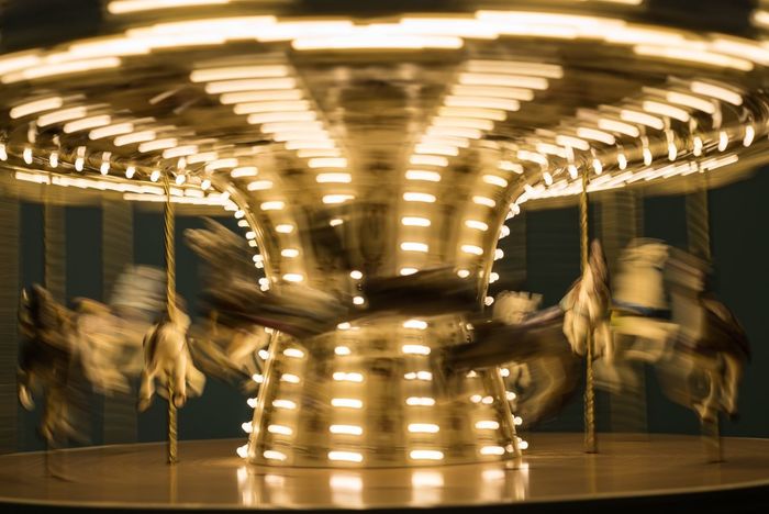 Blurred motion of illuminated carousel