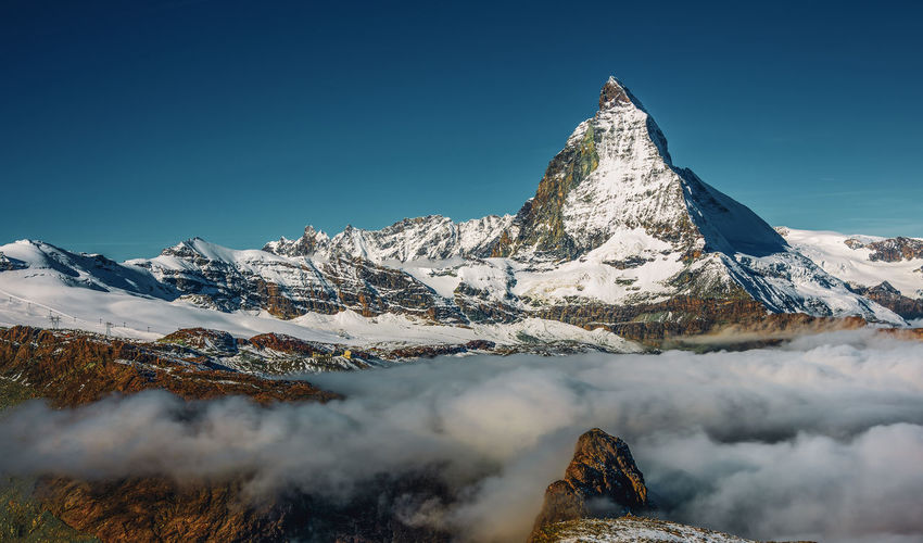 View of the matterhorn above the clouds