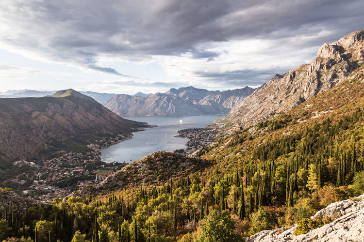 Scenic view of adriatic sea amidst mountain against sky