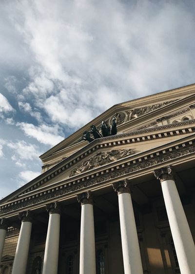 Low angle view of bolshoi ballet theater against sky