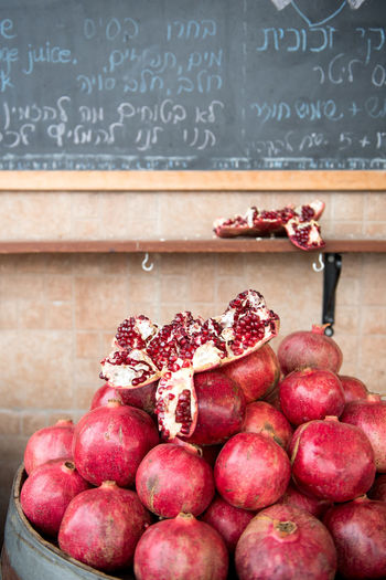Fresh pomegranates adorn a hip cafe in tel aviv.