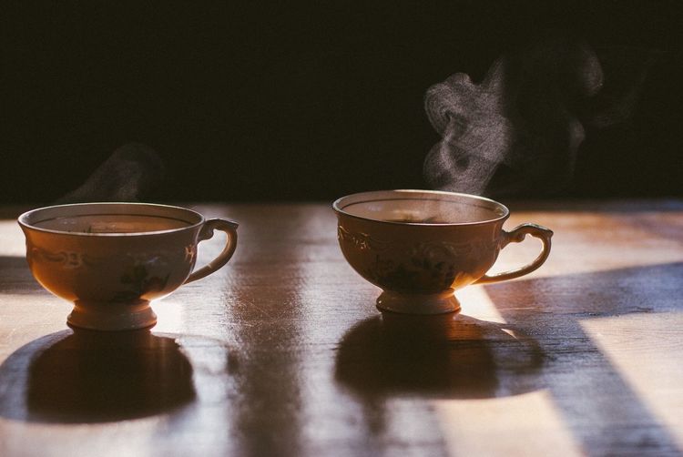 Close-up of coffee cup on table