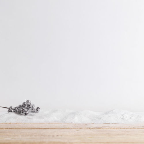 Scenic view of snowcapped field against sky