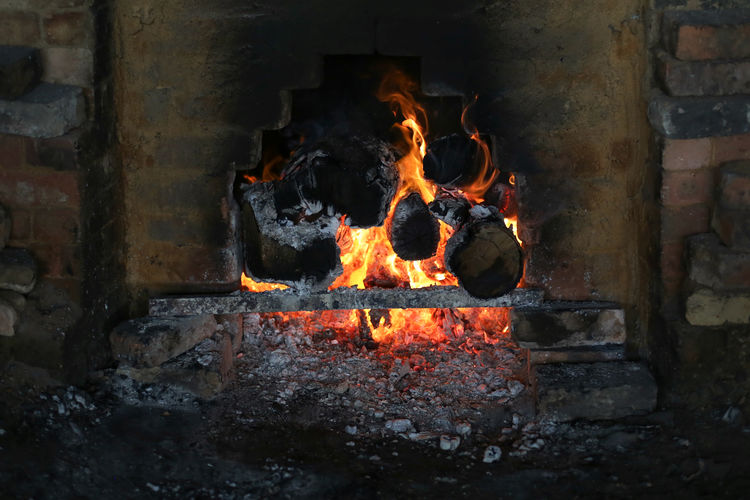 Bonfire on wooden wall