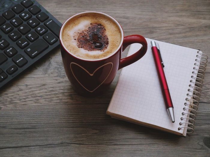 High angle view of coffee cup on table