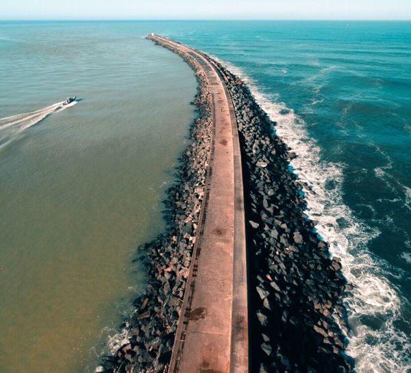 High angle view of groyne on beach