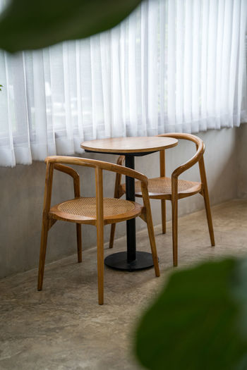 Empty chairs and table at home