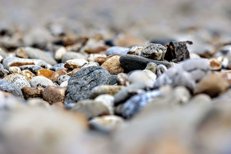 Close-up of stones on beach