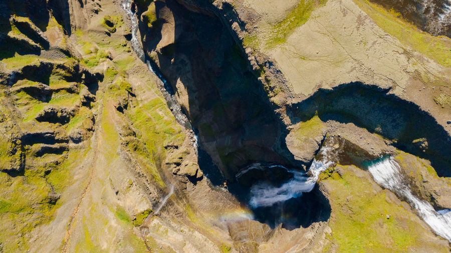 High angle view of rock formations in water