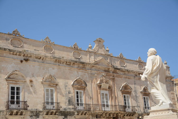 Low angle view of historical building against clear sky