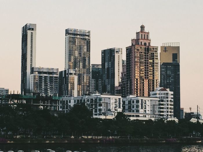Modern buildings against sky in city