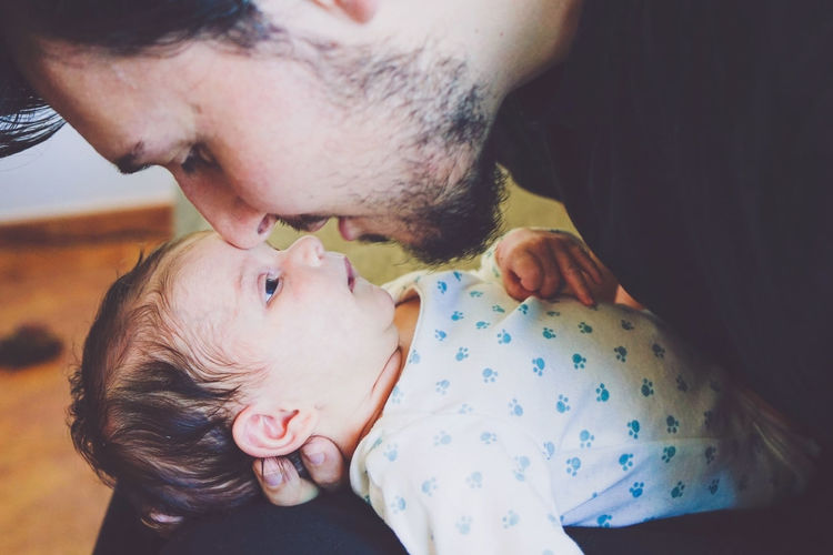 Midsection of father with daughter