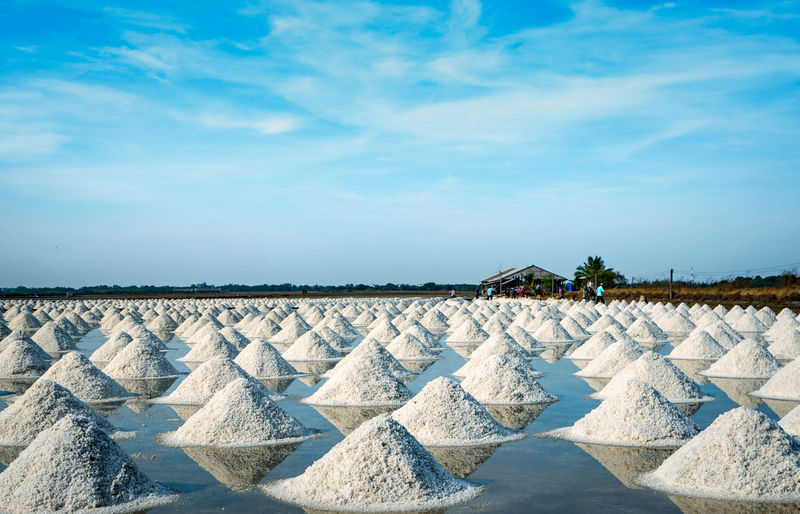 Sea salt farm and barn in thailand. organic sea salt. raw material of salt industrial. sodium.