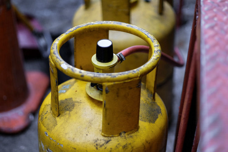 Close-up of gas cylinder at home