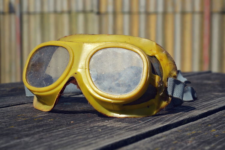 Close-up of protective goggles on table
