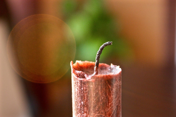 Close-up of drink on wood