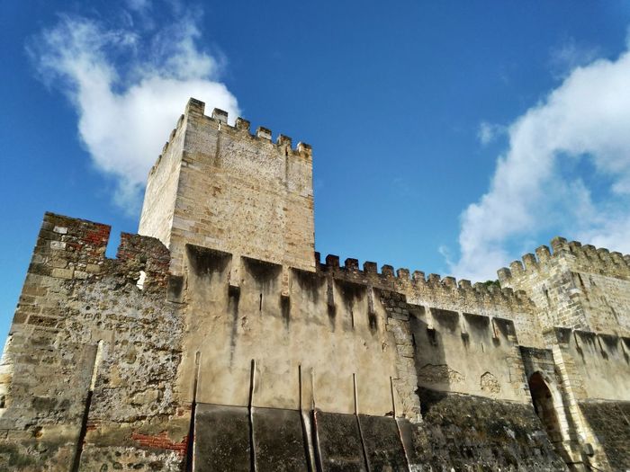 Low angle view of old building against sky. castle, lisbon, portugal. 