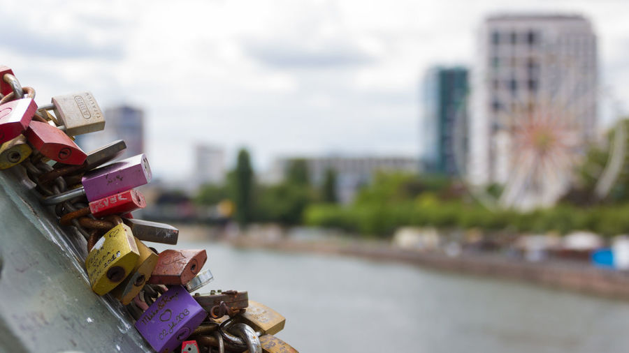 Close-up of padlocks on metal city
