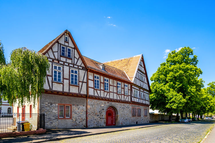 Exterior of building by street against sky