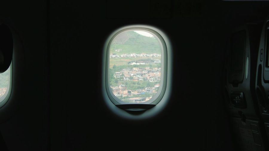 Close-up of airplane seen through window