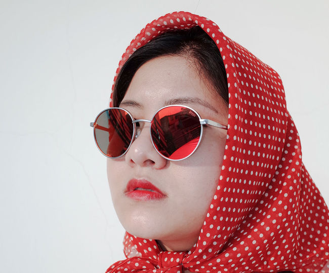 Close-up of woman wearing sunglasses