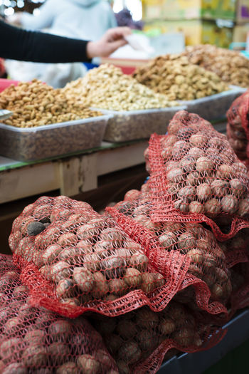Walnut bags and shelled walnut counters. grocery bazaar. sale of vegetables and fruits and nuts.