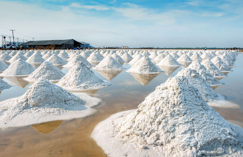Sea salt farm and barn in thailand. organic sea salt. raw material of salt industrial. sodium.