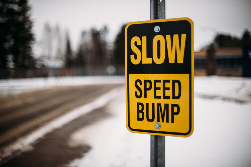 Speed bump sign in residential neighbourhood.