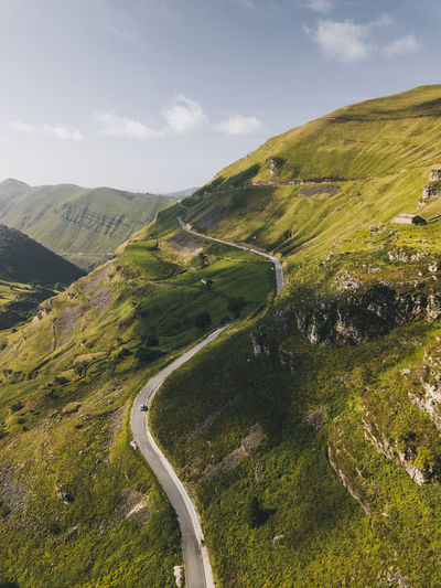 Winding road up to the mountains in valles pasiegos cantabria, spain