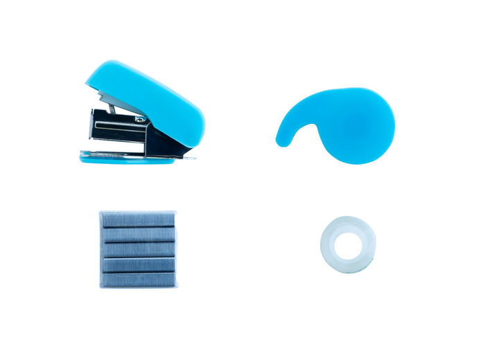 Close-up of blue lights over white background