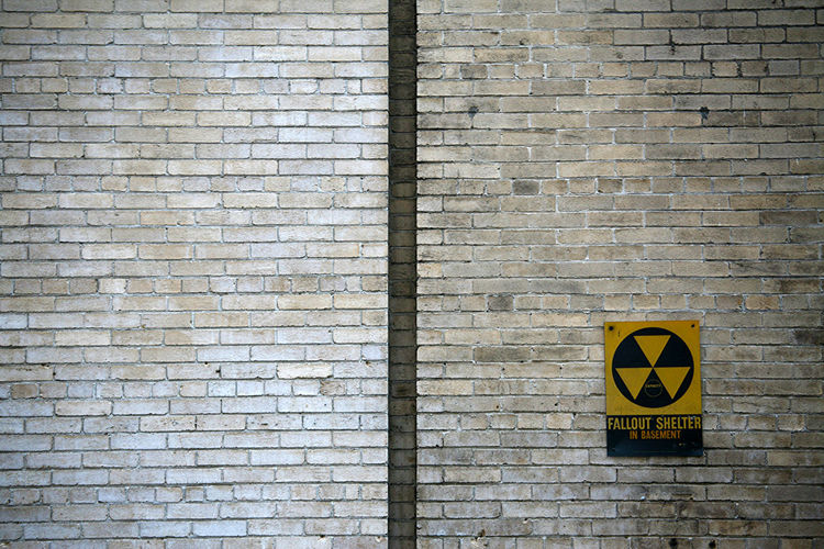 Text on brick wall