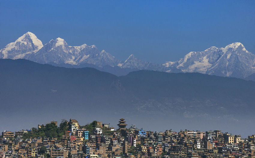 The view of kirtipur along with mountain in the background.
