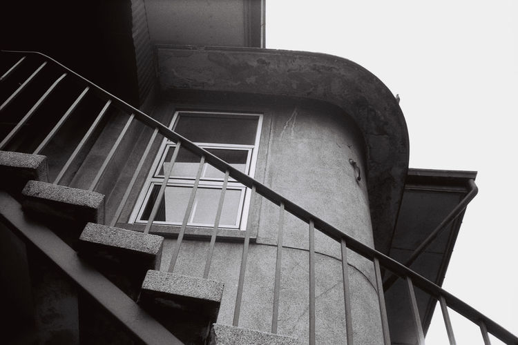 Low angle view of spiral staircase against building