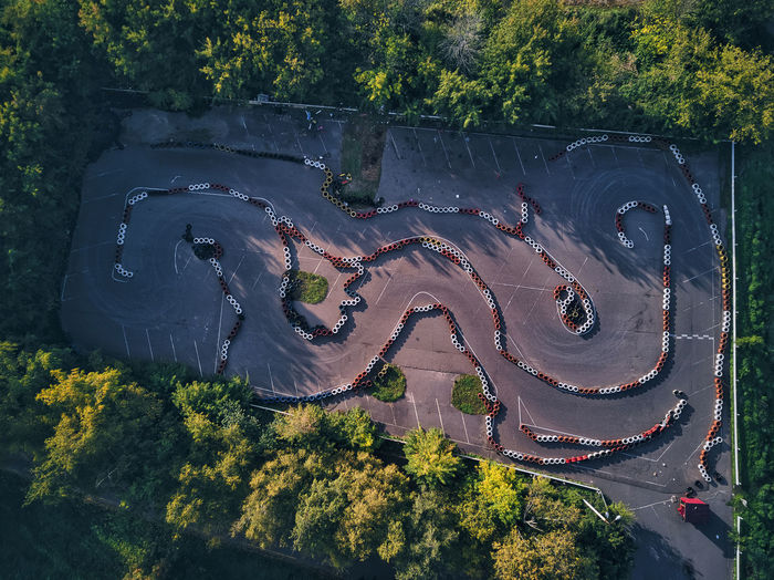 Aerial view of go-cart track amidst trees