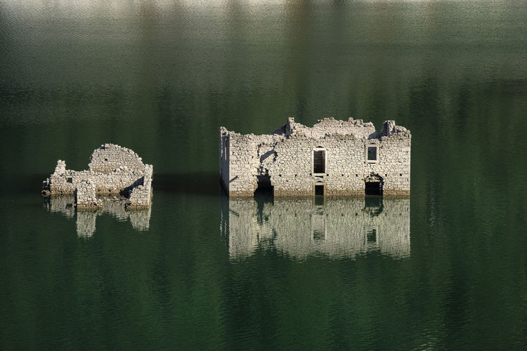 Old building by lake