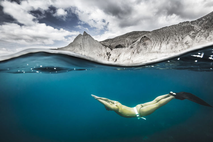 Woman swimming in sea
