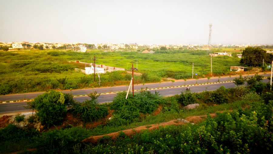 High angle view of trees on field against sky