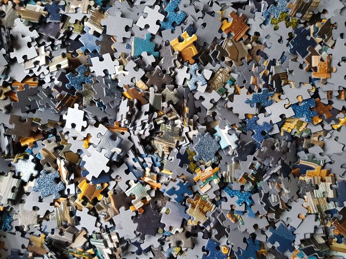 High angle view of puzzles on floor
