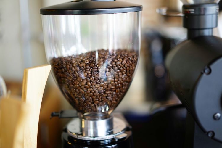 Close-up of coffee blender and coffee bean
