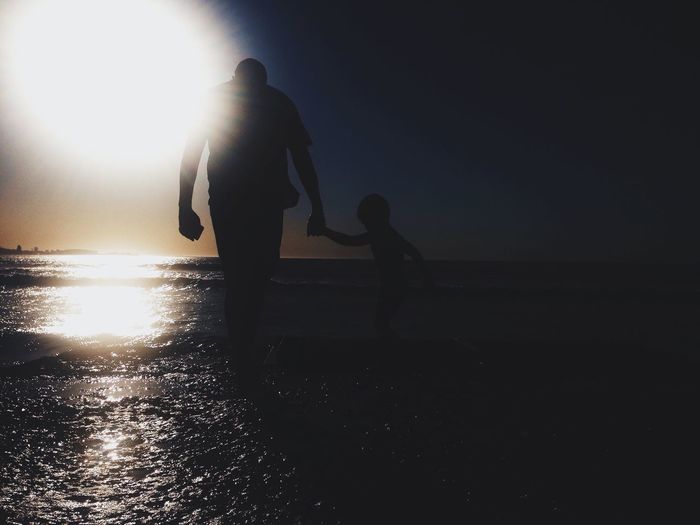 Sun shining over sea